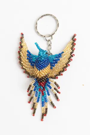 Fringe-tailed hummingbird; large; blue/gold with bright blue head